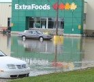 Part of the lake that has engulfed the town of High River, 60 km south of Calgary. The water is contaminated with sewage and gasoline say local officials. | Barbara Duckworth photo