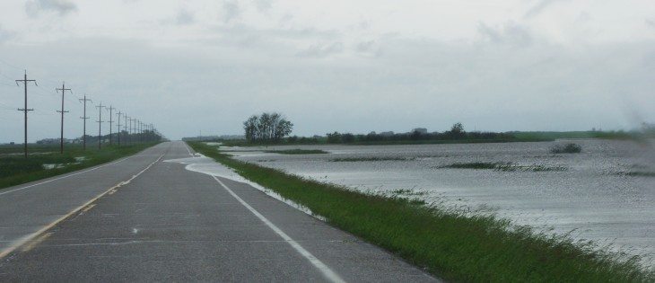 June 29, 2014 at 7:00 p.m. north of Souris, Manitoba on Highway 250 after 102mm of rain fell in 24 hours. | Diane Winters photos