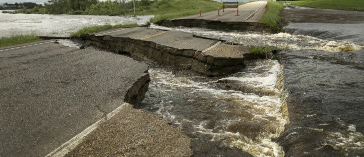 Heavy rains cut through farmland, roads and anything else that get in the way, including Highway 8, 22 Km south of Langenburg, Sask. | Robin Booker photo