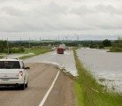 Water floods Highway 80 just north of Esterhazy, Sask.  |  Robin Booker photo