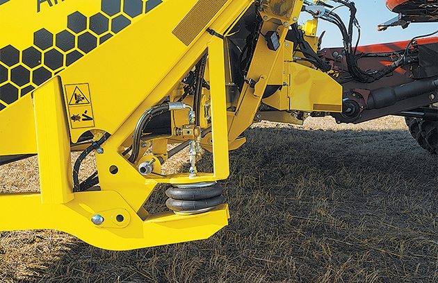 Air bags fed from an electrically powered compressor manage the flex system, allowing for easy control in changing conditions. | Honey Bee photo