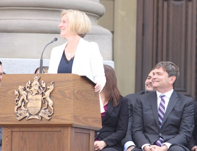 Alberta premier Rachel Notley and agriculture minister Oneil Carlier during the swearing in ceremony of the new government. | Mary MacArthur photo