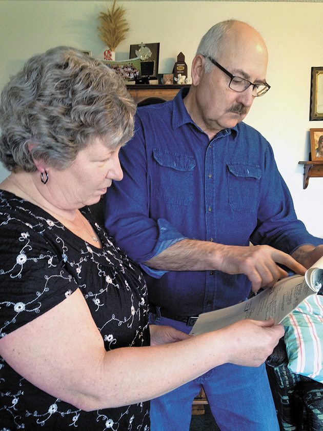 Eileen and James Yakimchuk look at their extensive family tree. They look forward to a family reunion this summer. | Tennessa wild photo
