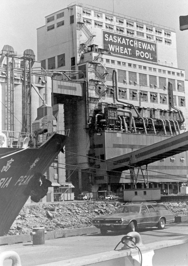 Note the new dust control equipment that had recently been installed on Saskatchewan Wheat Pool’s grain terminal in Vancouver. The photo, which was taken from the deck of a loading grain ship, was taken in the summer of 1978. | File photo