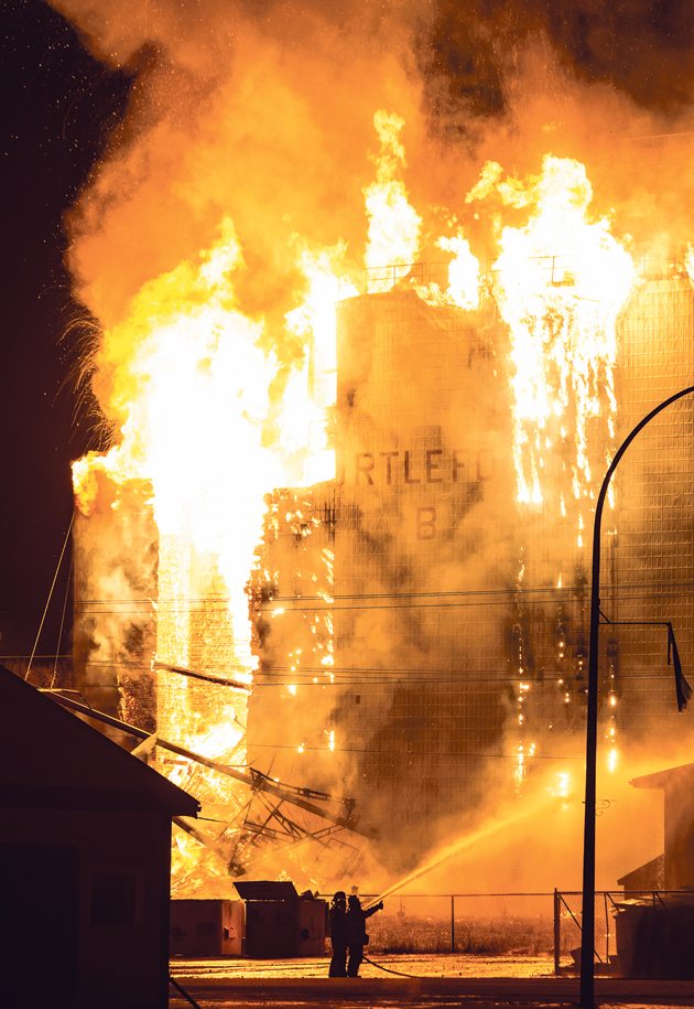 Fire destroyed a grain elevator in Turtleford, Sask., Nov. 29. There was initially concern that the blaze would spread to other businesses, but firefighters were able to keep it contained. | Rebecka Bloom photo