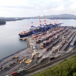 An aerial image of the Port of Prince Rupert with a ship at dockside.