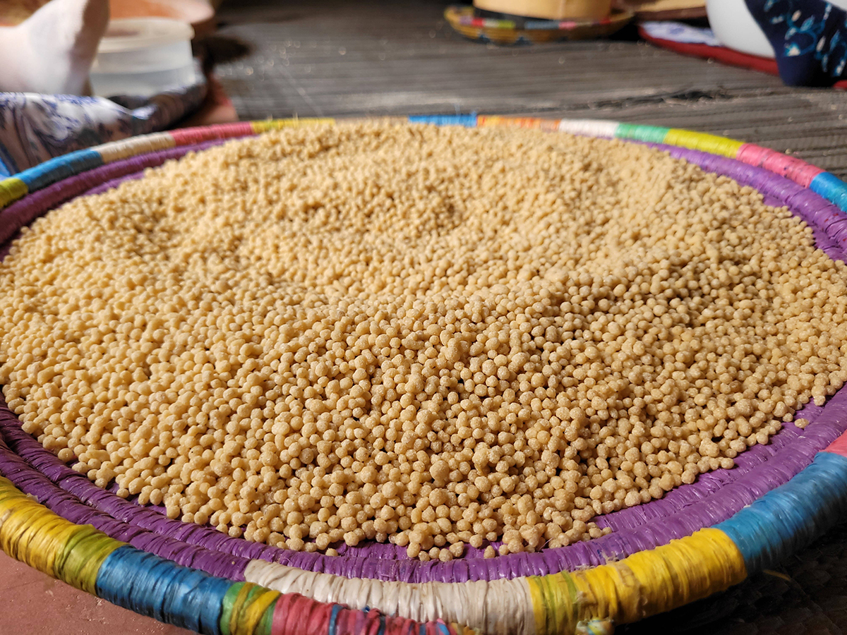 Cous cous in a colourful bowl.