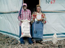 The Canadian Foodgrains Bank works with partner organizations to provide food aid and support farmers in developing countries, such as Congolese chicken farmer Rebecca (pictured - right), to grow food and support their families and communities. Photo: Canadian Foodgrains Bank/Facebook