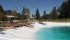 A white plastic liner gives a dugout the illusion of white sandy beaches at Jerry and Marina Leussink’s farm near Sundre, Alta. | Mary MacArthur photo