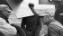 Opposition to the Canadian Wheat Board wasn't always strong among prairie farmers, such as these photographed in 1956. That would start changing in the 1970s. | File photo