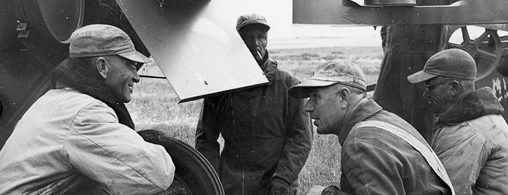 Opposition to the Canadian Wheat Board wasn't always strong among prairie farmers, such as these photographed in 1956. That would start changing in the 1970s. | File photo
