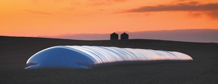 While grain bags can never completely replace bins, they can be a short-term, lower cost alternative. | File photo