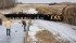 For 14 years, the Abrahamson family has been making an ice pad in the pasture for a game of hockey. | William DeKay photo