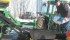 Gordie Devries loads canola seed after positioning the bag hauler next to the lift platform. | Leighton Schappert photo