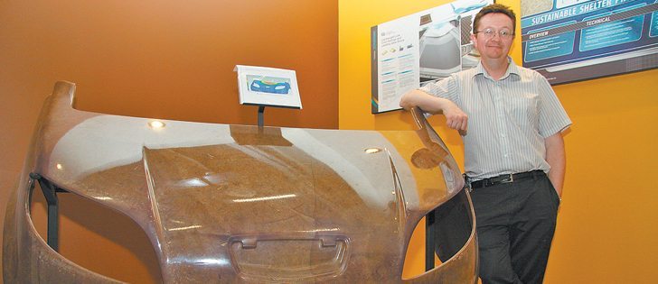 Simon Potter, sector manager for product innovation at the Composites Innovation Centre in Winnipeg, leans against a vehicle body part made from hemp and other fibres. The part, on display at the Composites Innovation Centre, will be one of the components of a unique vehicle called the Kestrel.  |  Robert Arnason photo 