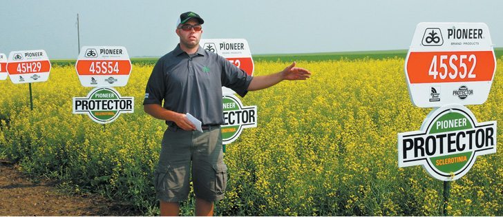 Claude Sander of DuPont Pioneer said the company’s line of sclerotinia resistant canola delivers higher yields than many people are aware.  |  Sean Pratt photo