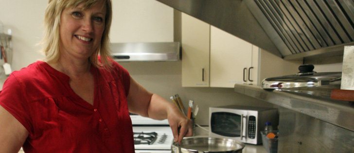 Margarita Pischke of the 100 km Kitchen Company, stirs a pot of soup in the Easyford Community Centre kitchen. This is where Pischke and her partners turn local food into james, jellies, pickles and chutney. | Mary MacArthur photo