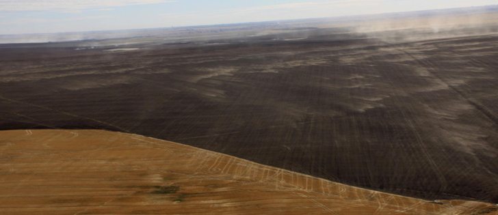 About 12,500 acres burned in the County of Lethbridge last week with strong winds gusting to 110 km/h fanning the flames. It threatened many area residents. No lives or homes were lost, but property damage is extensive. This photo shows the sharp contrast where burned and unburned fields meet.  |  Dennis Shigematsu, County of Lethbridge photo