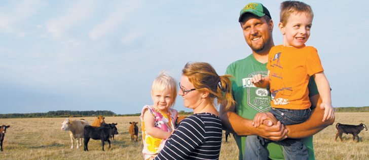 Richard and Kristy-Layne Carr, along with Slade, 4, and Elora, 18 months, raise grass-fed cattle on their farm near La Broquerie, Man. The Carrs manage a herd of about 120 cows in addition to pigs and chickens, on top of their full-time jobs, and have become skilled at juggling their roles as parents, employees and livestock producers.  |  Robert Arnason photo