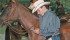 John Lukacs of Olds, Alta., checks his messages before heading into the auction ring at the annual Western Horse Sale held in Red Deer Sept. 28. | Barbara Duckworth photo