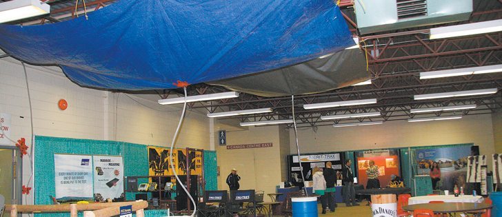 Heavy rain and snow meant leaky roofs in Evraz Place, which housed Canadian Western Agribition Nov. 19-24. Tarps, hoses and barrels were found throughout the buildings.  |  Karen Briere photo