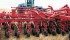 Morris Industries’ disc drill uses downward pressure from the packer to keep each disc in contact with the soil for even seed placement. | Morris Industries photo