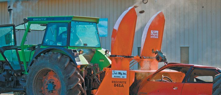 As a test, the Snocrete 848A devoured this little red car and spit out the pieces. The Snocrete, designed for maximum durability, suffered no damage. The little red car, designed for cheap transportation, did not survive the test.  |  Delvonna Wentz photo