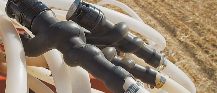 The Dutch Airguard reduces the pressure in the product line before the opener, allowing seed or fertilizer to land accurately in the furrow, without the bounce caused by high air flows associated with larger application rates.  |  Dutch Industries photo