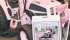 In support of breast cancer survivors, members of Manitoba’s Westman Dragon Boat Team, including Merle Darling, sold raffle tickets for an all-pink Kioti CK30 tractor and bucket. | Ron Lyseng photo