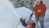 Murray McWilliams clears snow from his backyard in Regina. His snowblower can be used with one hand so he can access his cane with the other hand. A built-in safety device shuts the snowblower off automatically when the operator lets go of the machine. | Karen Morrison photo