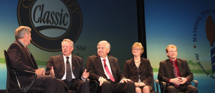 American farm leaders share a laugh with moderator Mark Mayfield, left, during the general session of the 2013 Commodity Classic. Next to Mayfield are Terry Swanson, chair of the National Sorghum Producers, Danny Murphy, president of the American Soybean Association, Pam Johnson, president of the National Corn Growers Association and Erik Younggren, president of the National Association of Wheat.  |  Sean Pratt photo