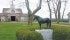 A monument to the great racehorse Seattle Slew stands in front of the stallion barns at Three Chimneys Farm, which consists of 2,300 acres and offers boarding, marketing and breeding services to Thoroughbred owners. | Barbara Duckworth photo