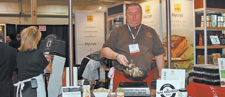 Chef Bruno Elsier used cocoa butter to saute mushrooms from Ponderosa Mushrooms of Port Coquitlam, B.C., at the SIAL food show in Toronto.  |  Karen Morrison photo