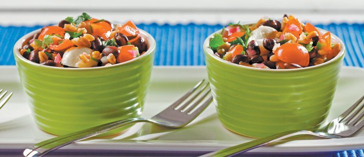 Farro is a type of wheat common in Italian cooking. It has a nutty flavour with a slightly crunchy texture. Although it’s a distant cousin to the wheat berry, it cooks in a fraction of the time. Farro can be found in health food stores or substituted with wheat berries. | canolainfo.org photo