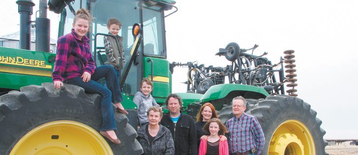 The Logan family operates Wheatcrest Farms near Lomond, Alta. The family includes Hannah, left, Jaxon, Sam, Marie, Doug, Heather, Hailey and Glenn Logan. Missing from the photo are Marie and Glenn’s daughter, Tamara Okubo, son-in-law Shin, and their children Eva, Max and Kale.  |  Barb Glen photo