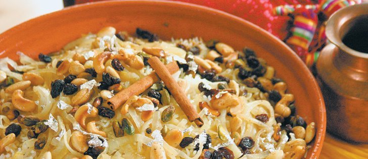 Lamb biryani is garnished with edible silver leaf, spices and dried fruit and nuts.  |  Sarah Galvin photo