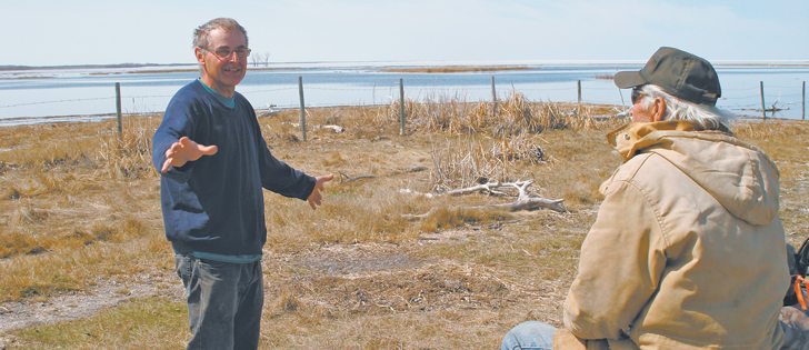 Orval, left, and Fred Procter are taking on additional costs this year because rising lake levels have limited access to pastures and hayland on their Manitoba ranches.  |  Ed White photo