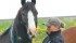 Michelle Peake catches her horse, Gus, on her ranch near Homestead Coulee, Alta. | Mary MacArthur photo