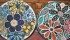 Linda Henye turns old dishes into mosaic creations, making stepping stones and wall art. She begins with a pencil sketch to visualize how to use each piece. | Karen Morrison photo