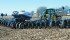 Carrying a full load of seed and fertilizer to maintain even planting in the field takes hydraulic weight transfer from centre section to the wings. | Kinze photos