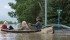 Two woman were rescued from their residences by a canoe in the High River flood. | Mike Sturk photo