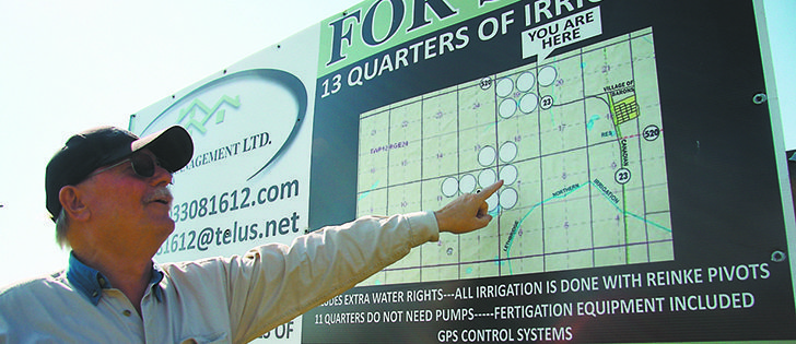 Brian Patterson, associate broker with Clear View Property Management Ltd., convinced Allen to advertise the asking price for his farmland on a billboard in a field along Highway 23. It has attracted some attention. |  Barb Glen photos