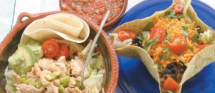 Clockwise: Layered taco salad, fresh garden salsa and ancho chicken tacos with avocado cream.  |  Sarah Galvin photo