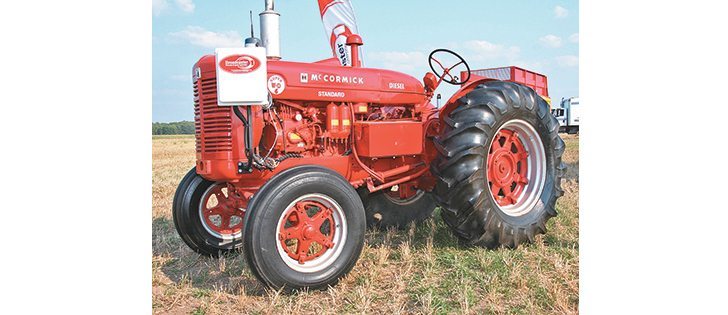 Why would anyone fit this rebuilt state-of-the-art 1940s McCormick tractor with a modern state-of-the art 2013 remote engine control? The answer: reduced labour.  |  Ron Lyseng photo