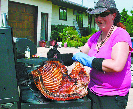 Sarah Coutts cooked lamb slowly on the smoker to create a tender harvest entree near Bulyea, Sask. Lamb is roasted in a number of different ways in countries around the world.  |  Sarah Galvin photo