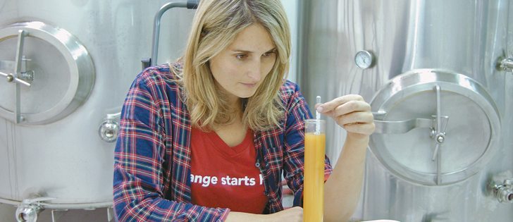 Kate Garthwaite tests the specific gravity of apple cider produced in Mamette Lake,  B.C.  |  Left Field cider photo