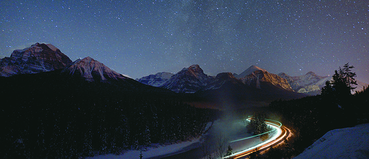 On a crisp -32 C night Dec. 3, a westbound freight train winds through Morant’s Curve east of Lake Louise, Alta. This year’s massive harvest has both major railways struggling to keep up with rail car demand.  |  Mike Sturk Photo