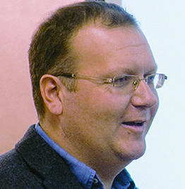 Tobias Schenk, an agronomist with Black Earth Farming Ltd., speaking at the Farm Forume Event on December 4, 2013.