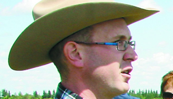 Rancher Sean McGrath leading a tour of the ALUS conservation projects on his ranch in Vermilion River county, Alta. | Bryn Levy Photo