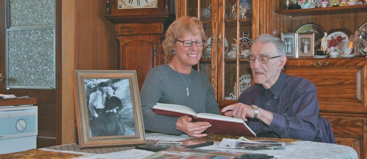 John Newbold reminisces with his niece, Mary Jane Newbold, about the early days. The centenarian says farming is a good life and he still enjoys having the sun shining on his face in the morning.  |  Karen Morrison photo